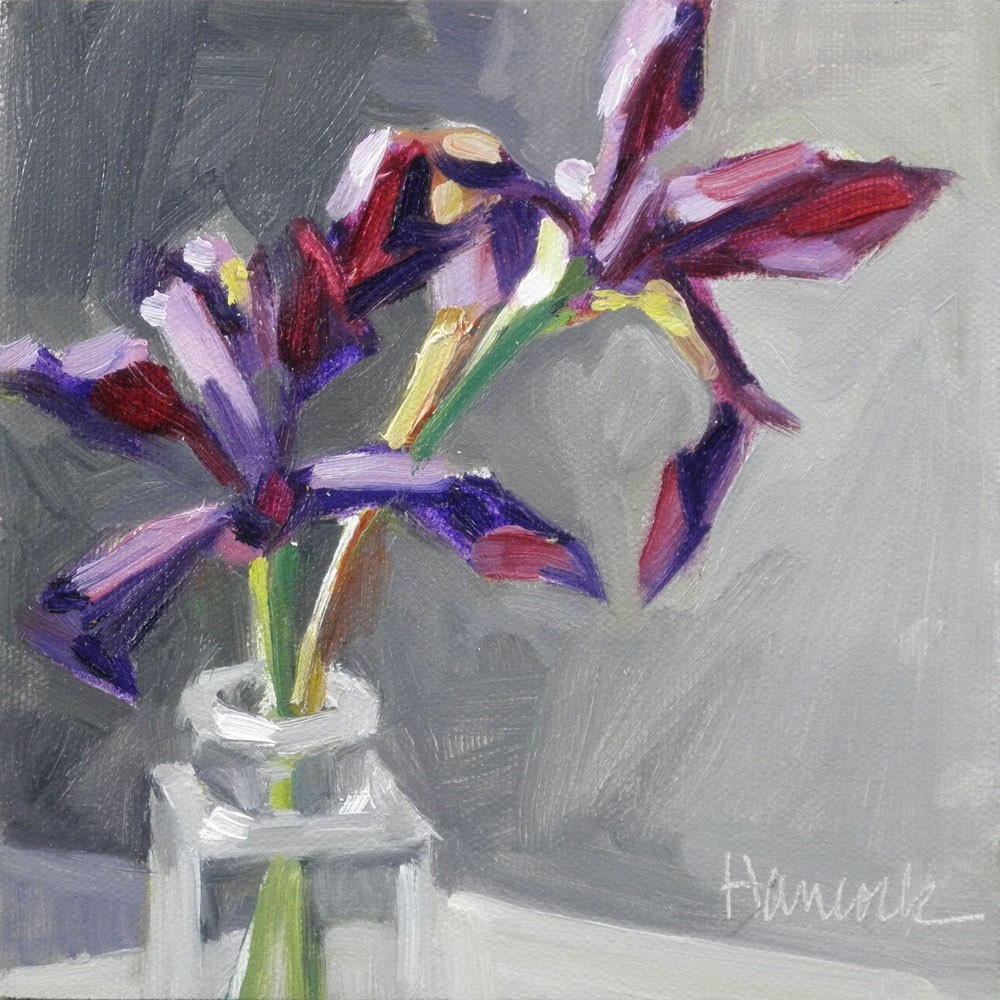 Two Purple Siberian Iris in a Glass Bottle