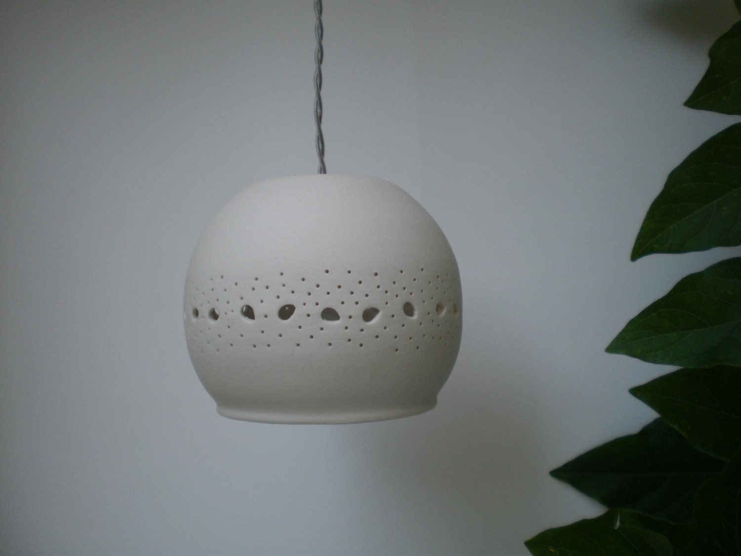 Small porcelain ball with lace