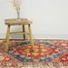Playful Tattered Vintage Turkish Rug