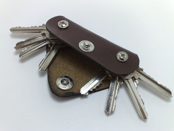 Extremely convenient keychain key holder from dark brown cowhide. Holds 6-8 regular keys, free monogramming , personalized/ belt hanger