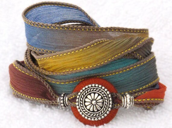 Silk Ribbon Whirly Wrap Bracelet southwest colors of sand turquoise sunset and gold with silver focal piece refined elegant desert colors