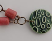 Green ceramic, pink rhodonite and brass necklace