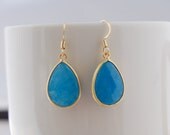 Gold and blue jade earrings
