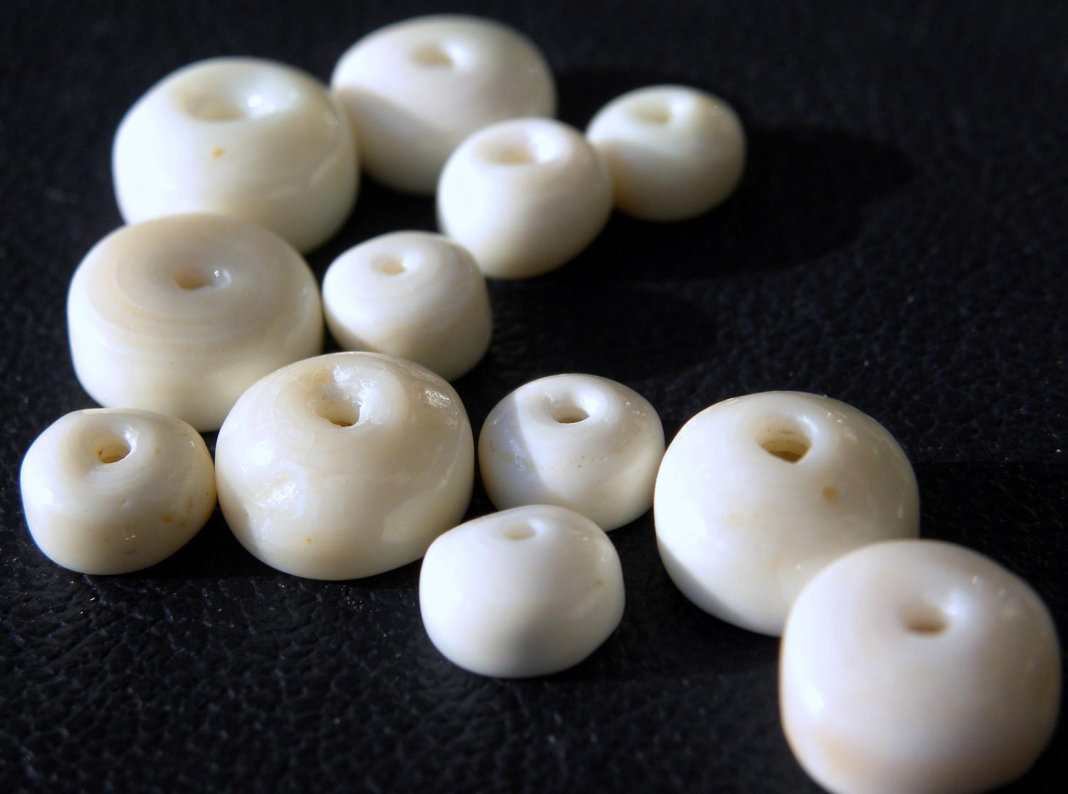 Hawaiian Puka Shells, jewelry making supplies, 25 med/large shells, 6-10mm
