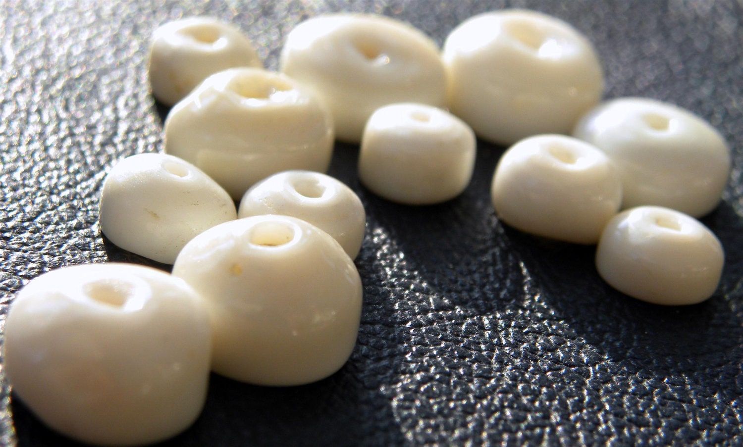 Hawaiian Puka Shells, jewelry making supplies, 25 med/large shells, 6-10mm