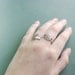 Silver crossed arrows signet ring