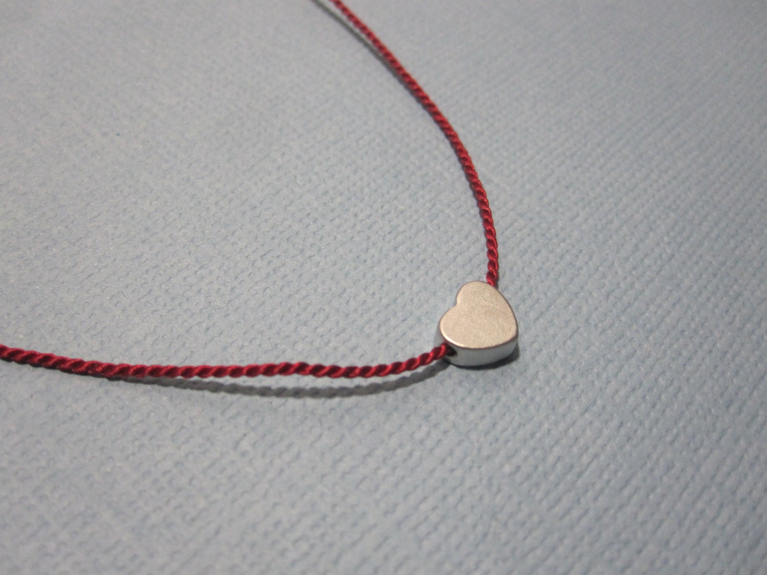 Silk Thread Tiny Heart Wish Necklace avaliable in gold and silver