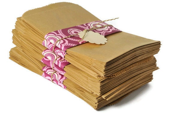 Flat kraft paper bags .100 natural favor bags . gift bag . treat bag . 5 by 7.5 inches . gift wrap . serrated . FDA compliant . candy bag