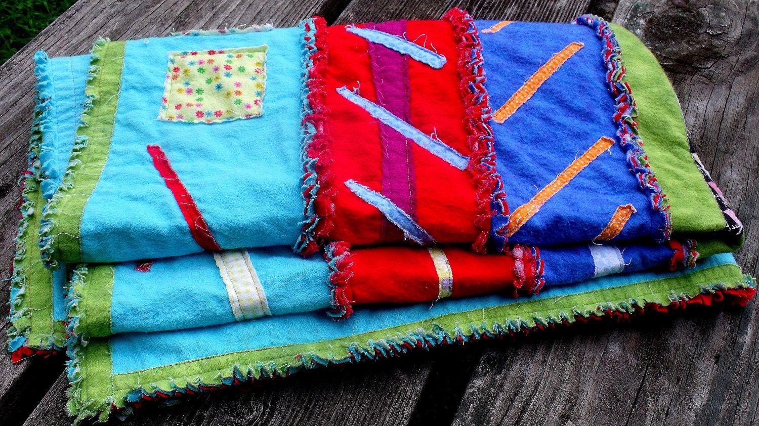 modern rag quilt, colorful small quilt, blue, aqua, green, red quilt