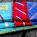 modern rag quilt, colorful small quilt, blue, aqua, green, red quilt