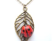 Antiqued Brass Leaf  Porcelain Ladybug Necklace