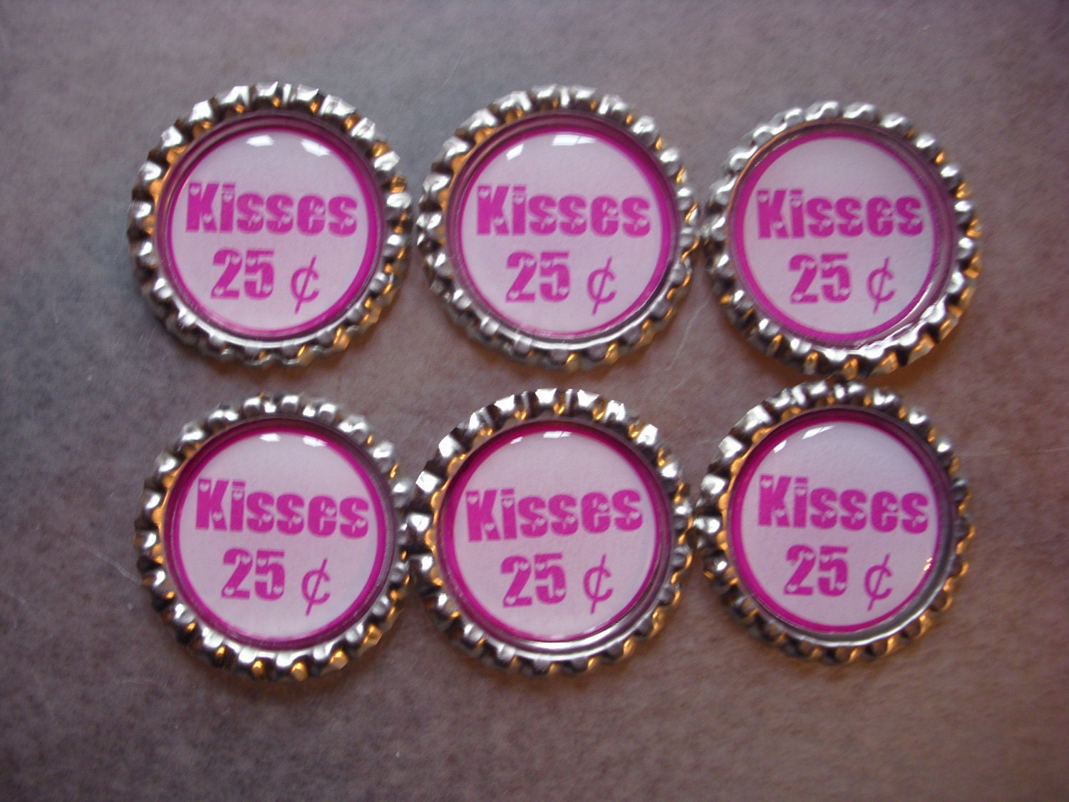Kisses 25 cents finished sealed flattened bottlecaps - Pink