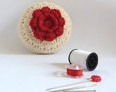 hot red flower on white. round crochet granny pincushion