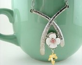 Crossed Branches with White Flower and Golden Maple Leaf Necklace