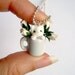 White kitten in a mug pendant - the cat and the rosebuds