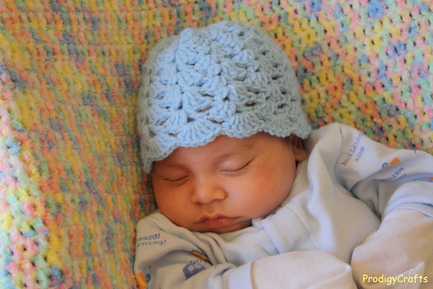 Crocheted Newborn Hat, available in pastel blue, dark blue and pink