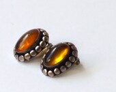 Amber clip on earrings, sterling silver ovals