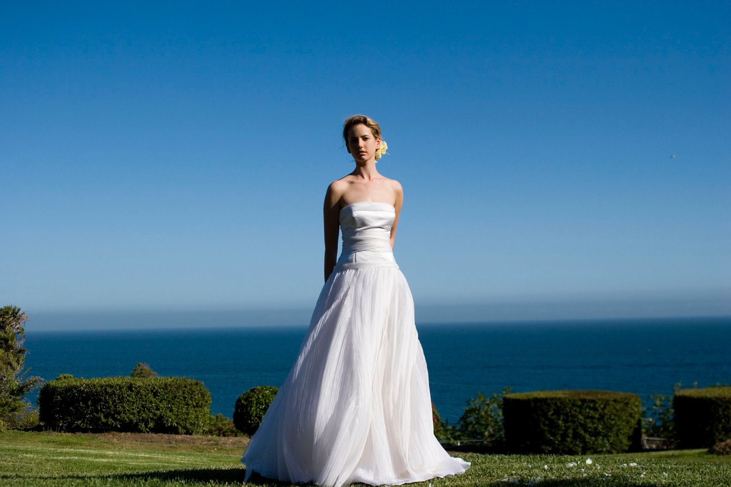 Classic white strapless silk satin and pleated silk organza wedding dress