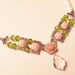 Pink Baroque Crystal Pendant Surrounded by Pink Roses, Spring Green Crystals and Pearls in this Wonderful Spring Necklace