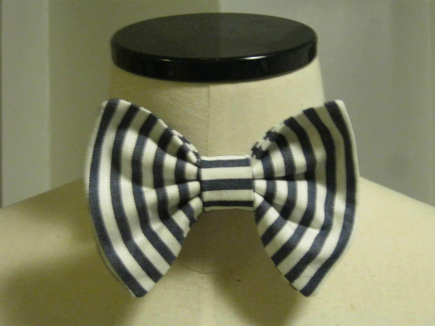 Blue and white striped bow tie