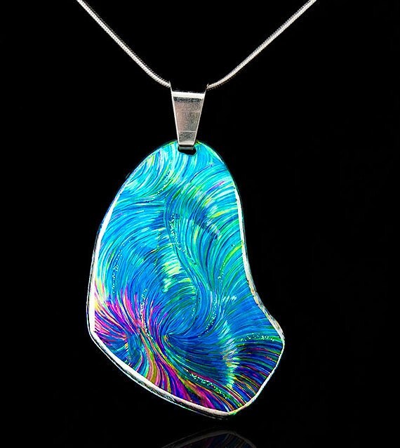 Four Dolphins Healing Pendant