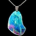 Four Dolphins Healing Pendant