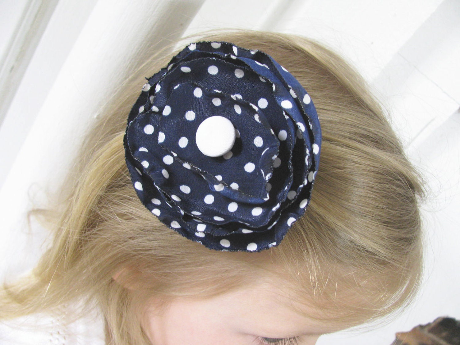 Navy blue with white polka-dot hair clip