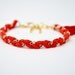 Coral red cotton braid bracelet