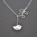 Sparrow pendant with branch connetor necklace.