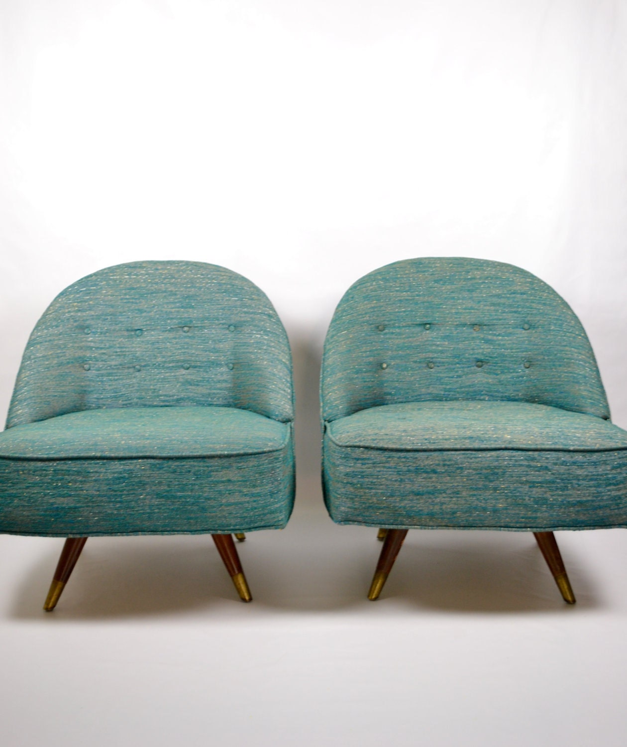 vintage pair of mid century modern green swivel lounge chairs