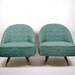 vintage pair of mid century modern green swivel lounge chairs
