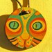 Cat Pendant Orange and Green. Hand painted round pendant with original design One of a kind