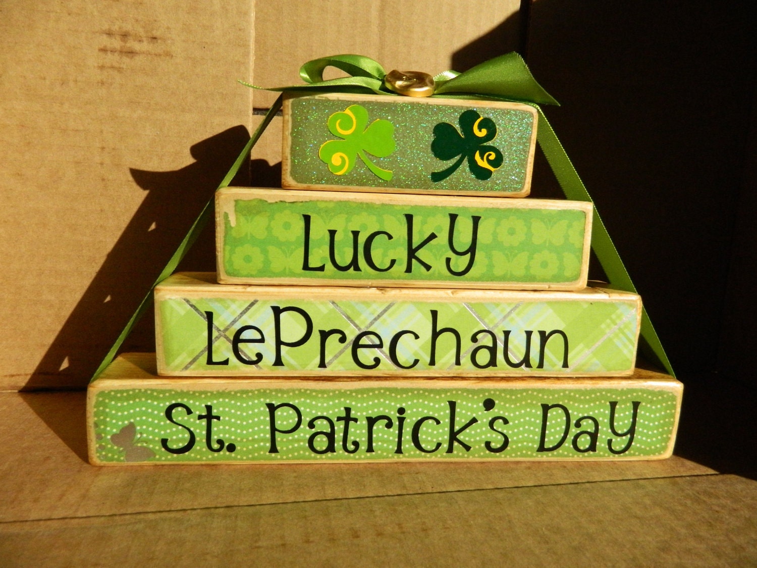 Wooden blocks St. Patricks Day stacker decoration for the holidays with lucky Irish leprechaun shamrock rock four leaf clover
