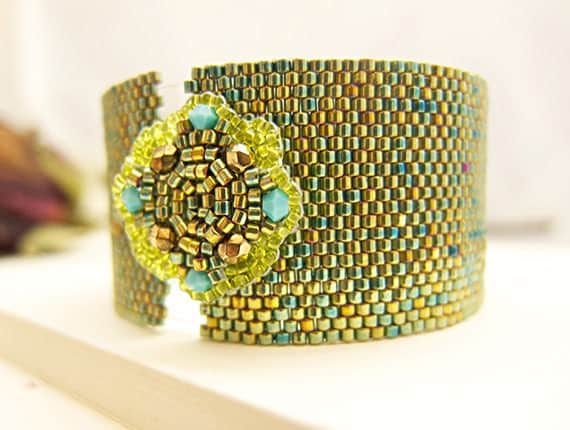Green Cuff Bracelet Beaded with Flower Motif Button Metallic Iridescent Sparkle Handmade by JeannieRichard