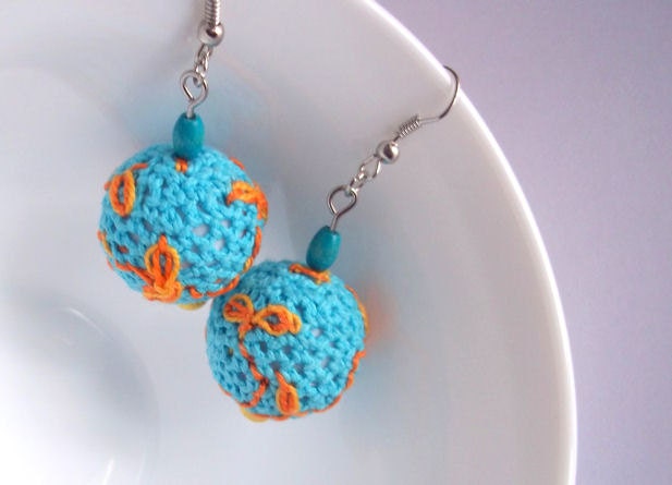 Turquoise crocheted dangle earrings orange embroidered branches and leaves ball earrings