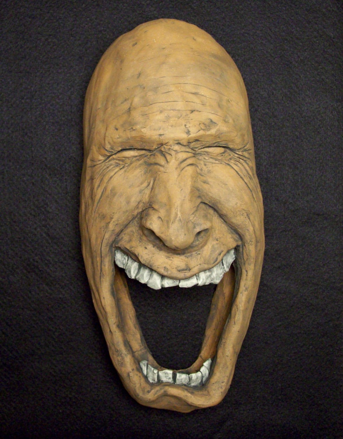 ceramic face sculpture