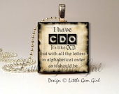 I have CDO it's like OCD but with all the letters in alphabetical order as it should be.  1"x1"  Wood Tile Necklace Pendant