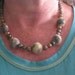 Green necklace , handmade of Felt and beads