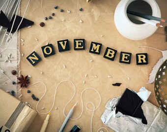 November - still life photography fine art black chocolate sepia brown autumn wall interior decor scrabble calendar star anise silver