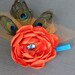 OOAK-One of a Kind- Orange Satin handmade peony bloom flower headband, fascinator with peacock feathers. "Claudia"