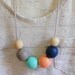 painted wood bead statement necklace - grey, navy, coral, turquoise