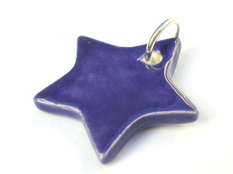 Purple star pendant with silver plated jump loop - handmade pottery