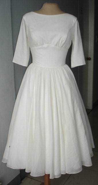 Very simple design which can be fully customized. Cotton 50s style cocktail dress. Have it made to measure, custom color, apply additions.