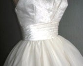 50s inspired ball dress with beautiful bust detail. Can be made to measure. All sizes welcome.