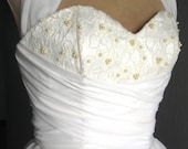 A beautifully elegant off-white Ivory 50s inspired gown