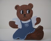 Wooden bear with dress