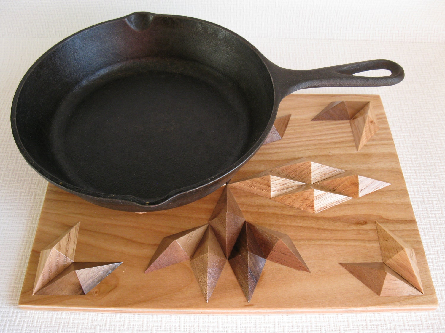 Wooden Hot Pad. Rectangle trivet with raised diamond shape hardwoods.