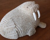 Alaskan Walrus carving Fossilized Whale bone and Ivory.