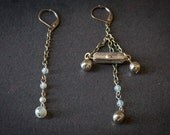 One of a kind steampunk glass bead and vintage watch part earrings