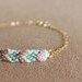 woven chevron gold bracelet - teal / grey